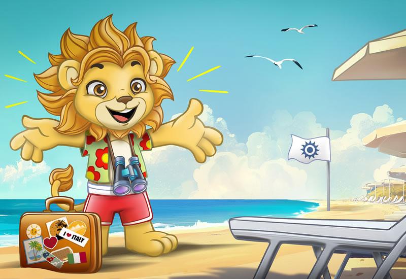 Un leoncino felice gioca sulla spiaggia sotto il sole estivo.